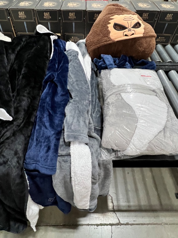 Photo 1 of BOX LOT: 9 Bath robs and one onesie, sizes varies