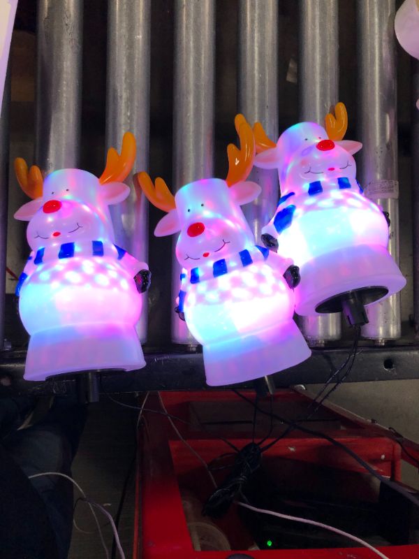 Photo 2 of Christmas Reindeer Decorations Pathway Lights, 3 Packs Multi-Color Flickering Reindeer Pathway Lights Decor, 3 in 1 Watertight Elk Landscape Path Lights for Christmas Outdoor Garden Lawn Decorations