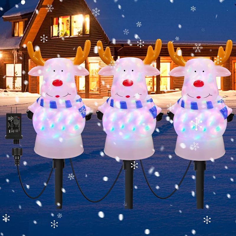 Photo 1 of Christmas Reindeer Decorations Pathway Lights, 3 Packs Multi-Color Flickering Reindeer Pathway Lights Decor, 3 in 1 Watertight Elk Landscape Path Lights for Christmas Outdoor Garden Lawn Decorations