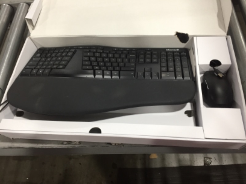 Photo 2 of Microsoft Ergonomic Desktop - Black - Wired, Comfortable, Ergonomic Keyboard and Mouse Combo, with Cushioned Wrist and Palm Support. Split Keyboard. Dedicated Office Key.
