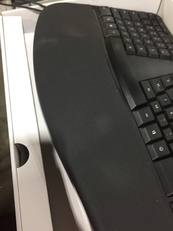 Photo 3 of Microsoft Ergonomic Desktop - Black - Wired, Comfortable, Ergonomic Keyboard and Mouse Combo, with Cushioned Wrist and Palm Support. Split Keyboard. Dedicated Office Key.
