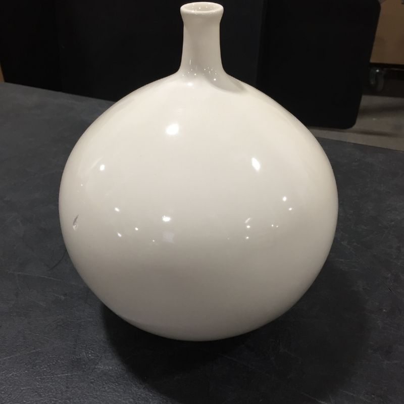 Photo 1 of DECORATIVE CERAMIC VASE WHITE 9W X 10H INCHES