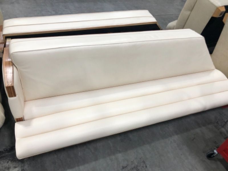 Photo 1 of CREME COLORED FAUX LEATHER L SHAPE SECTIONAL COUCH 100L X 26W X 38H INCHES (2 PIECES)
