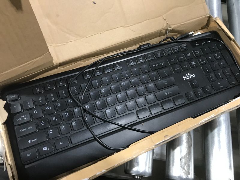 Photo 2 of Fiodio Rainbow Membrane Gaming Keyboard, Quiet Wired Computer Keyboard, 104 Silent Keys, 26 Anti-Ghosting Keys, Spill Resistant, Multimedia Control for PC and Desktop
