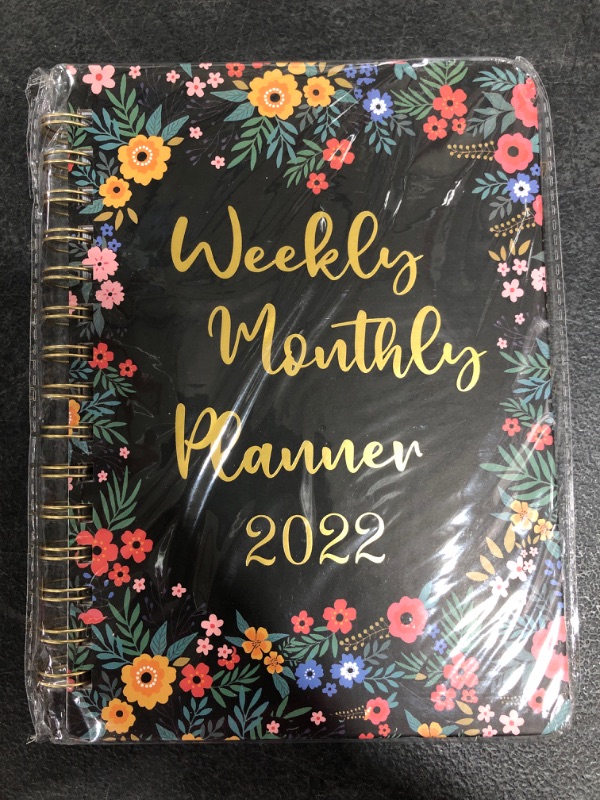 Photo 1 of WEEKLY & MONTHLY PLANNER 2022. 