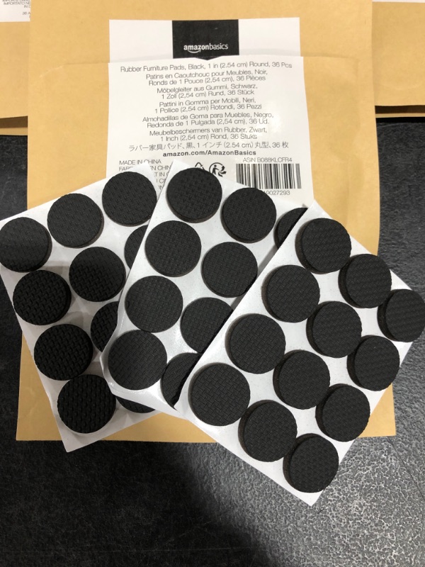 Photo 3 of Amazon Basics Rubber Furniture Pads, Black, 1'' Round, 36 pcs
LOT OF 3.