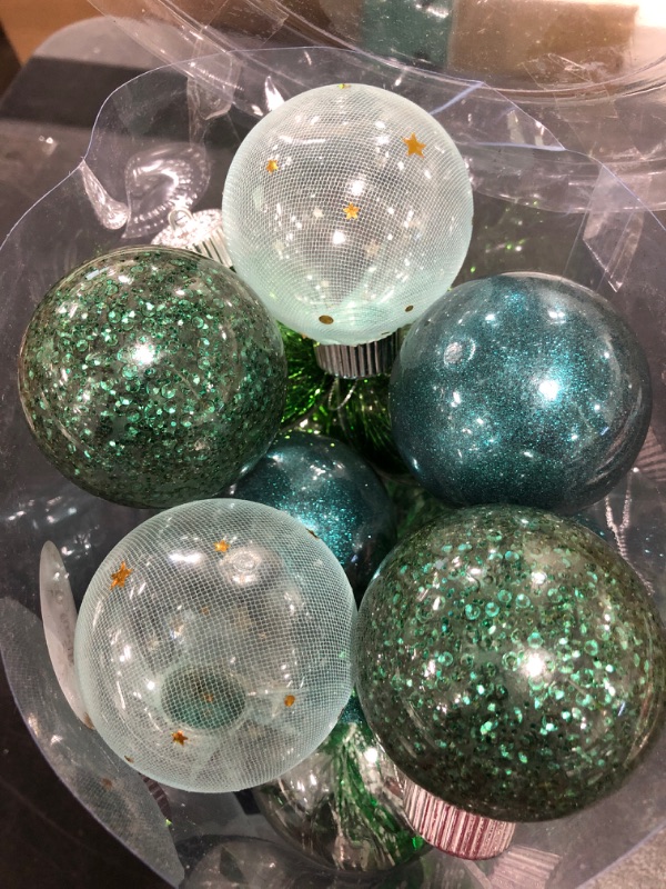 Photo 2 of CHRISTMAS TREE BALL STYLE ORNAMENTS, VARIOUS GREEN SHADES, OPEN PACKAGE.  