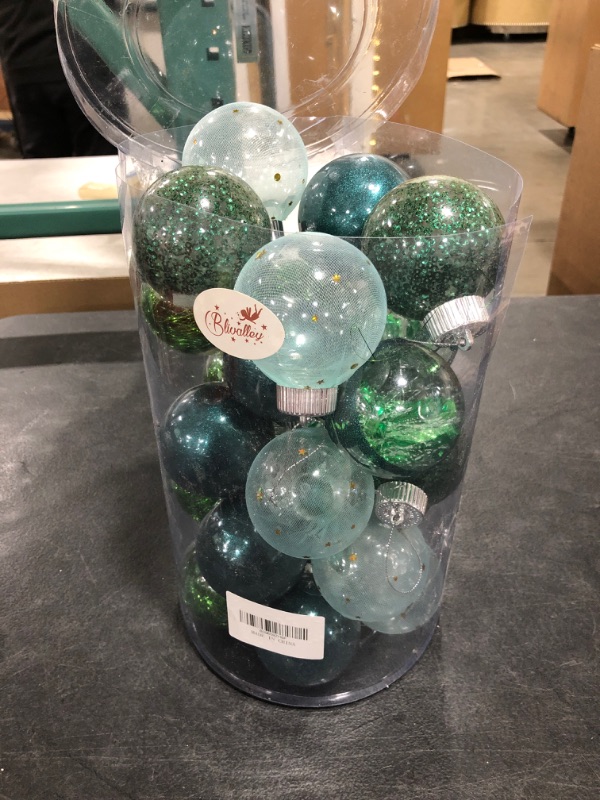 Photo 1 of CHRISTMAS TREE BALL STYLE ORNAMENTS, VARIOUS GREEN SHADES, OPEN PACKAGE.  