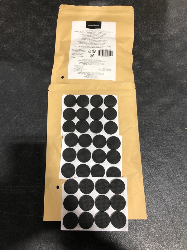 Photo 3 of Amazon Basics Rubber Furniture Pads, Black, 1'' Round, 36 pcs
LOT OF 2 .