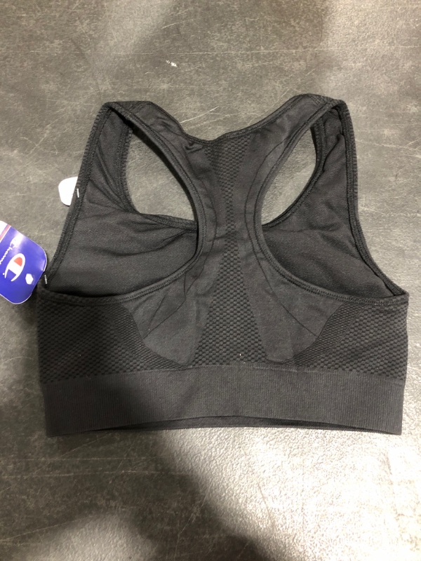 Photo 4 of Champion Women's Freedom Seamless Racerback Sport Bra
SIZE SMALL.