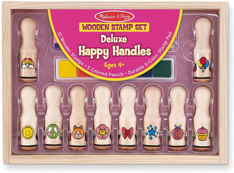 Photo 1 of Melissa & Doug Deluxe Happy Handle Stamp Set With 10 Stamps, 5 Colored Pencils, and 6-Color Washable Ink Pad
