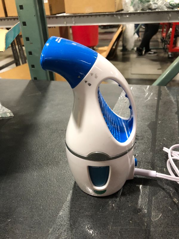 Photo 2 of Conair CompleteSteam 1100 Watt Handheld Fabric Steamer, White/Blue
