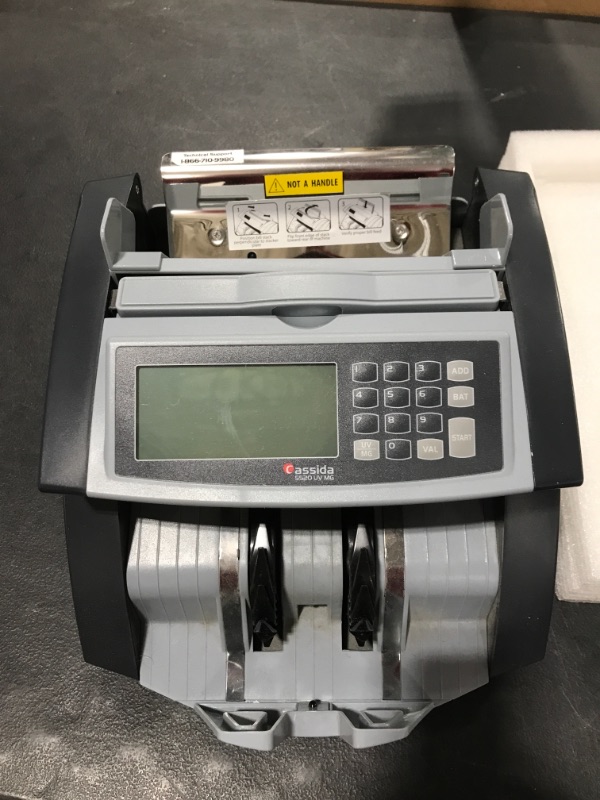 Photo 2 of Cassida 5520 UV/MG - USA Money Counter with ValuCount, UV/MG/IR Counterfeit Detection, Add and Batch Modes - Large LCD Display & Fast Counting Speed 1,300 Notes/Minute
PRIOR USE. TESTED WORKING.