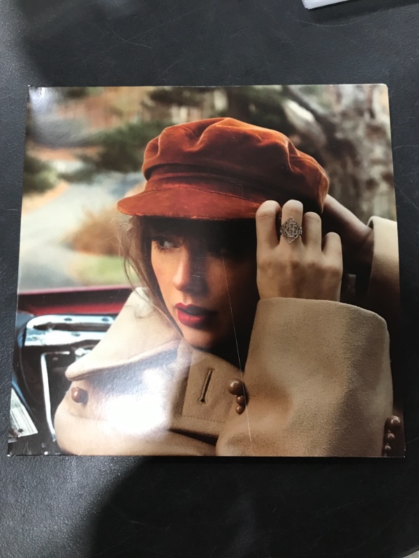 Photo 2 of TAYLOR SWIFT Red Taylor's Version, VINYL RECORD LP. Explicit Lyrics. PRIOR USE. MINOR COVER DAMAGE.
