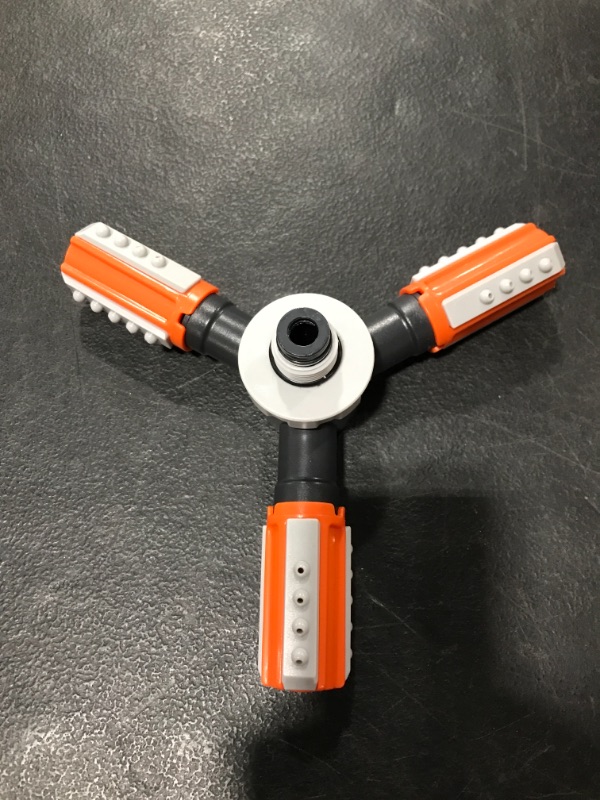 Photo 2 of AMAZON LAWN SPRINKLER. ORANGE/BLACK. 