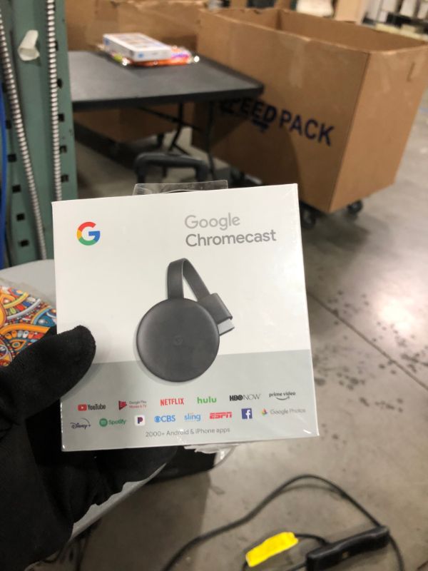 Photo 2 of Google Chromecast - Streaming Device with HDMI Cable - Stream Shows, Music, Photos, and Sports from Your Phone to Your TV
