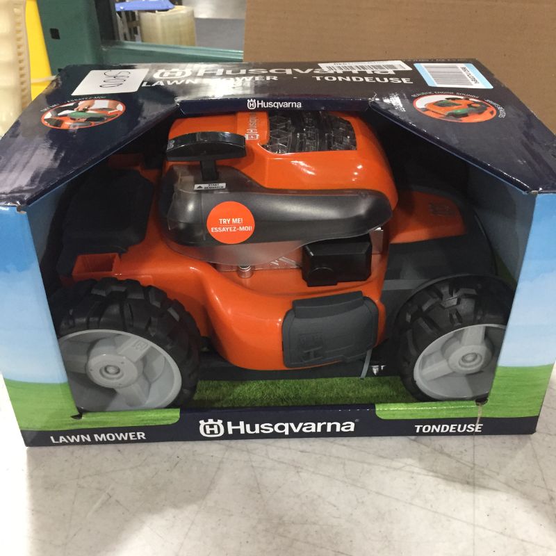 Photo 2 of Husqvarna 589289601 Toy Lawn Mower for HU800AWD
