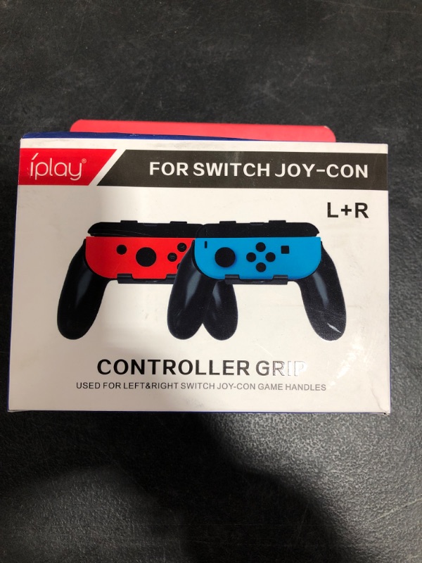 Photo 1 of NINTENDO SWITCH CONTROLLER GRIP, L & R. 