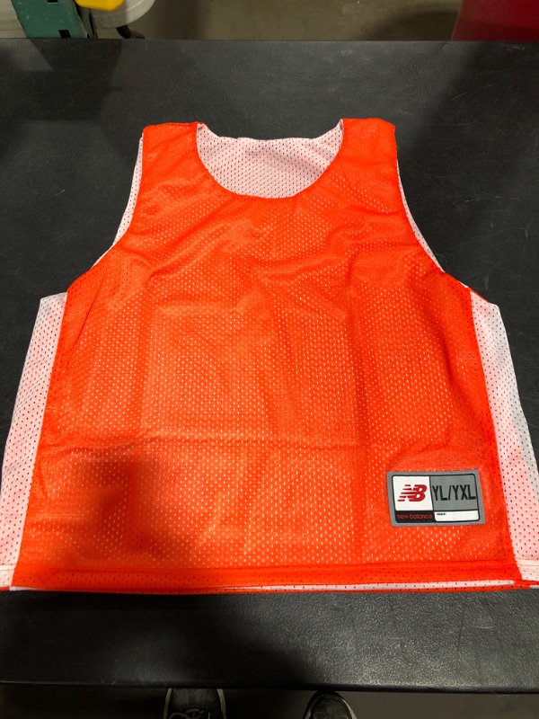 Photo 3 of New Balance Elite PinnieYouth. ORANGE/WHITE. SIZE LXL.
