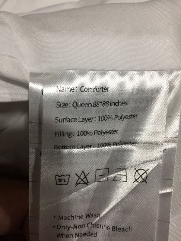 Photo 2 of All White Polyester Comforter Sz Queen