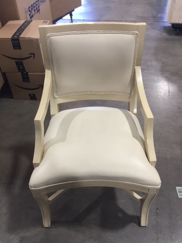 Photo 2 of FAUX LEATHER CREME DINING CHAIR APPROX. 24L X 24W X 37H INCHES