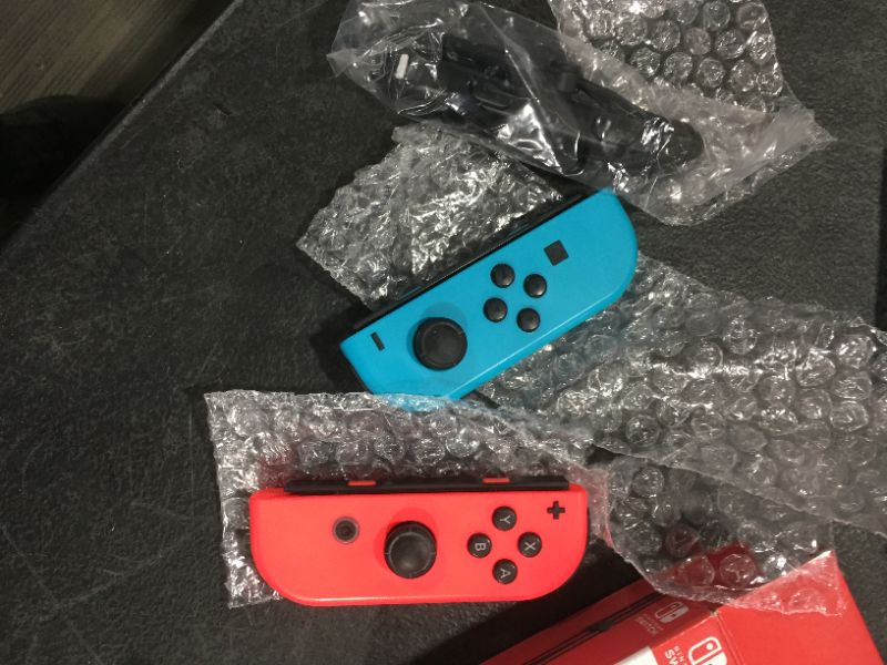 Photo 1 of Nintendo Joy-Con (L/R) - Neon Red/Neon Blue
