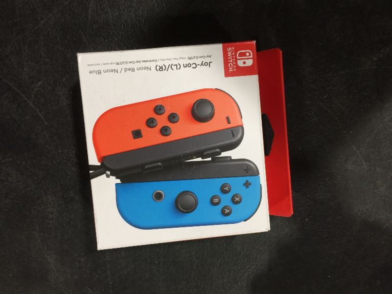 Photo 2 of Nintendo Joy-Con (L/R) - Neon Red/Neon Blue
