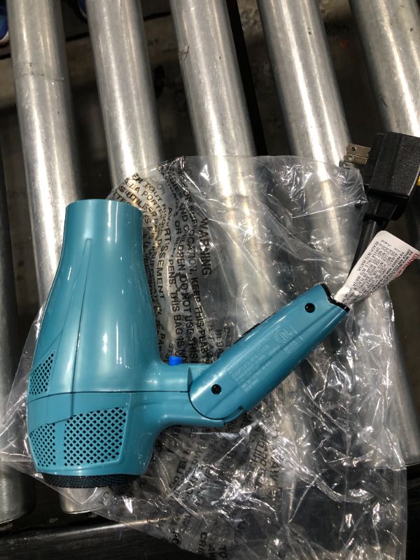 Photo 2 of Conair 1875 Watt Cord Keeper Travel Hair Dryer with Folding Handle and Retractable Cord Teal, Blue
