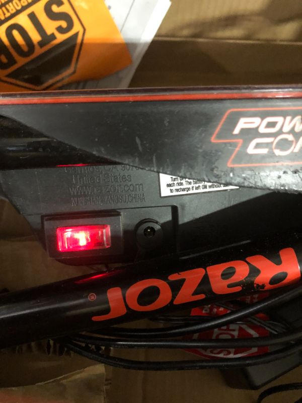 Photo 4 of Razor Power Core E90 Glow Electric Scooter - Hub Motor, LED Light-Up Deck, Up to 10 mph and 60 min Ride Time, for Kids 8+ , Black/Red (Glow)
