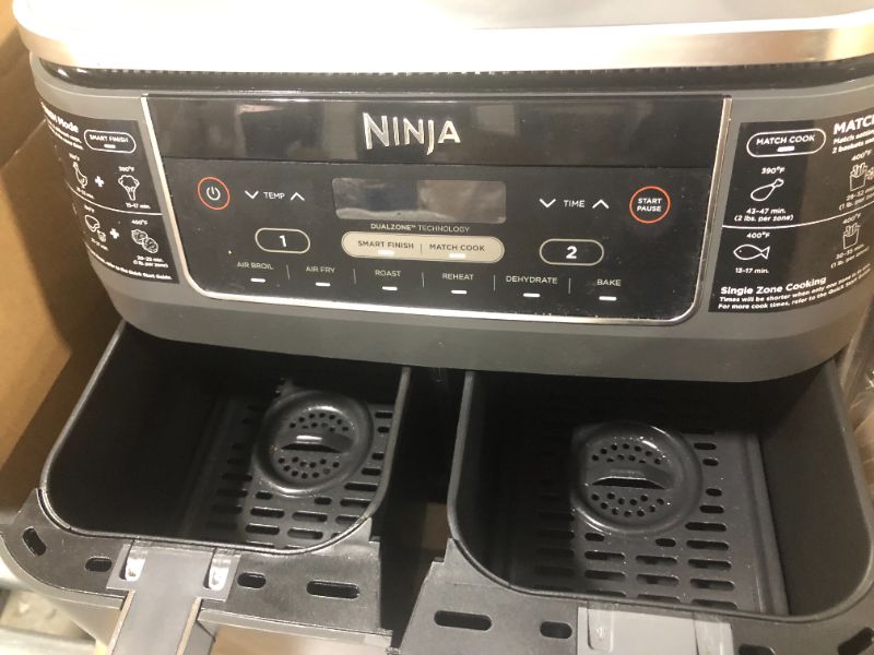 Photo 3 of DOES NOT TURN ON 

Ninja DZ201 Foodi 8 Quart 6-in-1 DualZone 2-Basket Air Fryer with 2 Independent Frying Baskets, Match Cook & Smart Finish to Roast, Broil, Dehydrate & More for Quick, Easy Meals, Grey