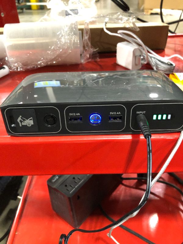 Photo 1 of HALO Bolt 58830 mWh Portable Phone Laptop Charger Car Jump Starter with AC Outlet and Car Charger - Grey
