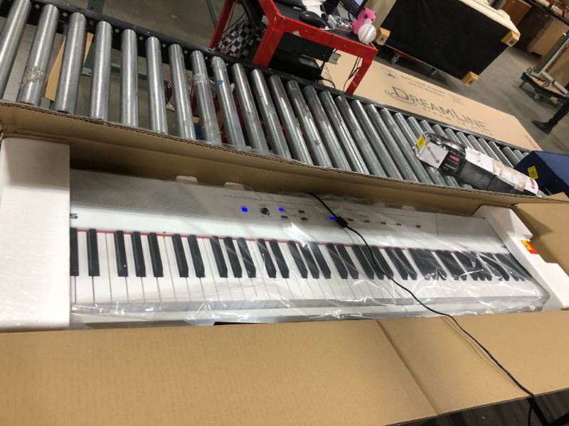 Photo 2 of Digital Piano Bundle - Electric Keyboard with 88 Semi Weighted Keys, Built-In Speakers and Sustain Pedal – Alesis Recital (White) and M-Audio SP-2
