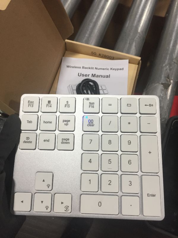 Photo 2 of Wireless Bluetooth Backlit Numeric Keypad, Rechargeable Number Pad with 34 Keys for PC/Laptop/MacBook/iMac/Surface Pro, Win/Mac OS, White Silver
