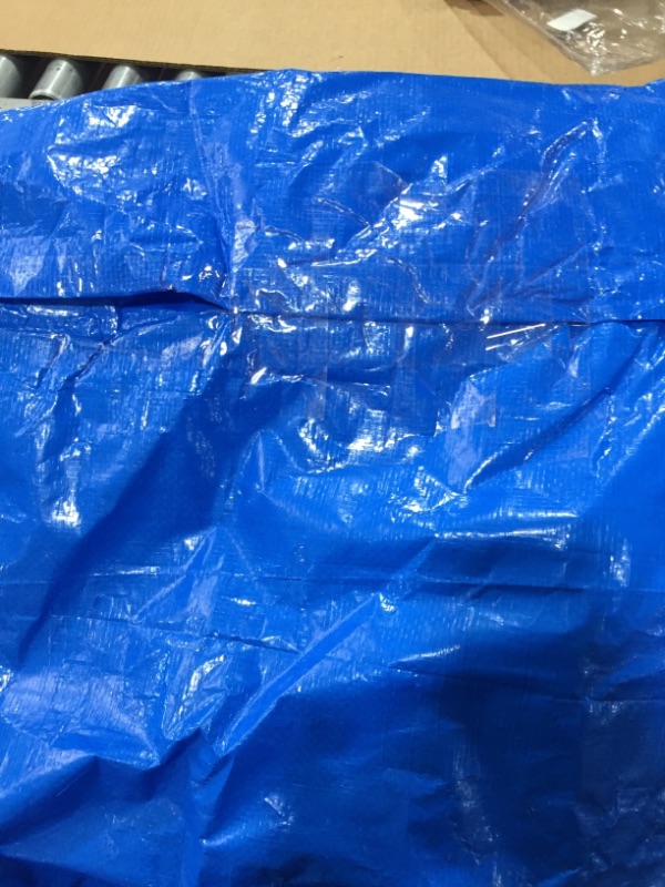 Photo 3 of Blue tarp size unknown with zippers 