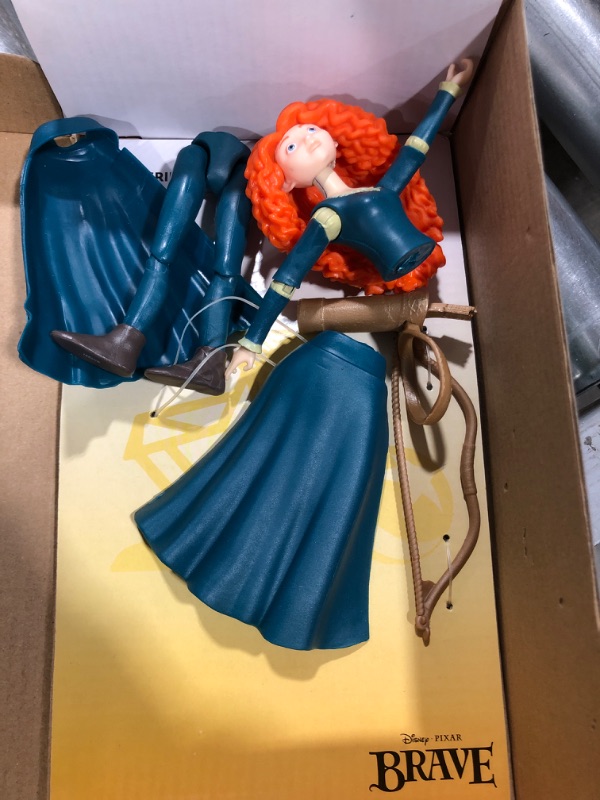 Photo 2 of Disney Pixar Brave Merida Action Figure, Movie Character Toy 6.6-in Tall, Highly Posable in Authentic Costume with Bow & Arrow