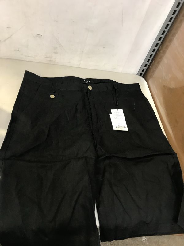Photo 1 of MEN'S SHORTS SIZE 36 PET HAIR ON ITEM