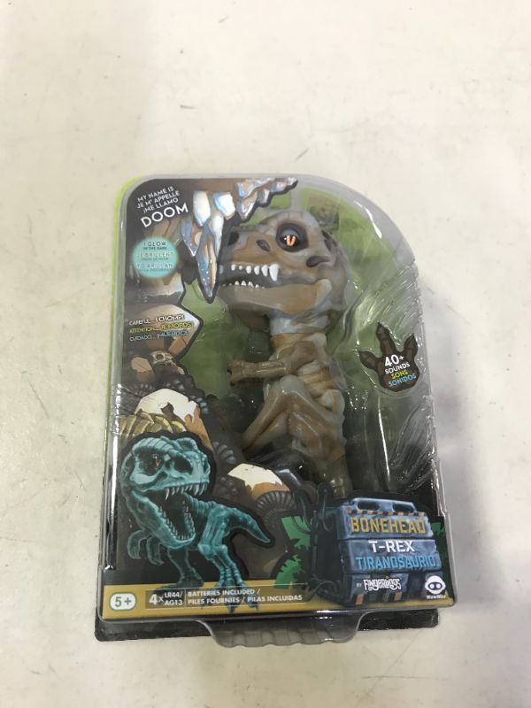 Photo 2 of WowWee Untamed Skeleton T-Rex by Fingerlings – Doom (Ash) – Interactive Collectible Dinosaur