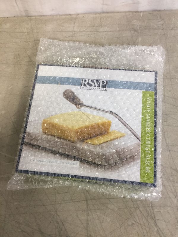 Photo 1 of RSVP International White Marble Cheese Slicer & Cutting Board, 5" x 8" | Cut Cheeses, Meats, & Other Appetizers | Each Piece Unique in Marble Coloring | Cut & Slice with Elegance
