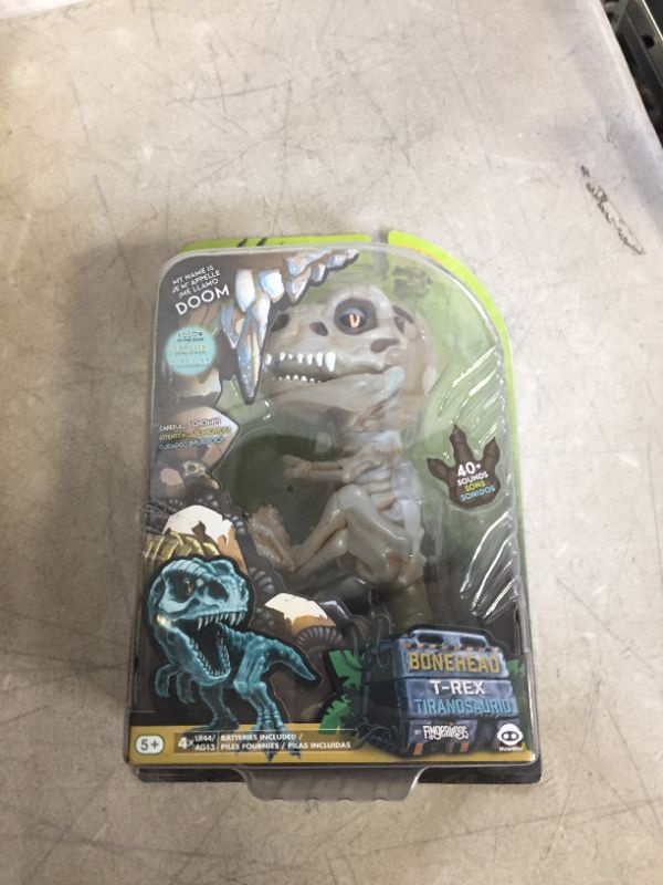 Photo 3 of WowWee Untamed Skeleton T-Rex by Fingerlings - Doom (Ash) - Interactive Collectible Dinosaur
(factory sealed)