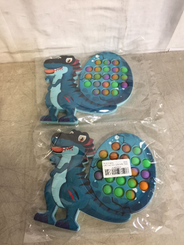 Photo 1 of FIDGET DINOSUAR POPPER (EASTER) 2 PACK 