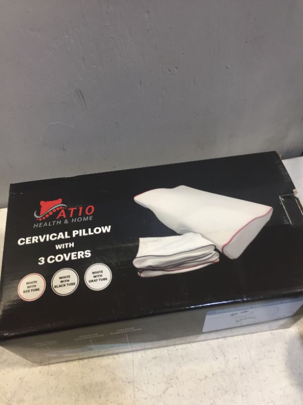 Photo 2 of cervicall pillow with 3 covers 