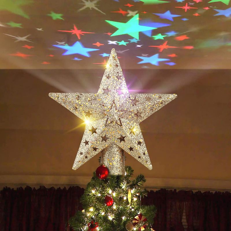 Photo 1 of Christmas Tree Topper Lighted 3D Hollow Golden Star with Rotating Projection Light for Christmas Decor , Christmas Tree Topper Star Project Dynamic Colorful Stars and Stable Enough

