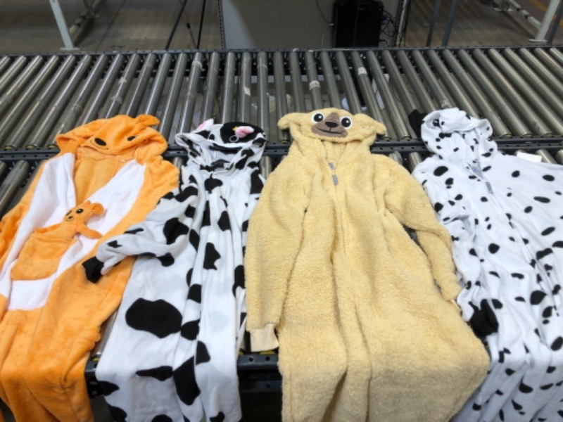 Photo 1 of ASSORTED BAG OF ONESIES, SIZES ARE FROM LEFT TO RIGHT M, XSMALL, SMALL, XLARGE. SLIGHTLY DIRTY FROM TRANSPORT.
