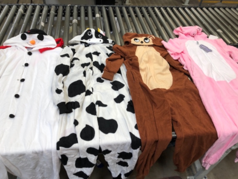 Photo 1 of ASSORTED ONESIES, SIZES FROM LEFT TO RIGHT. XLARGE, M, SMALL, SMALL.