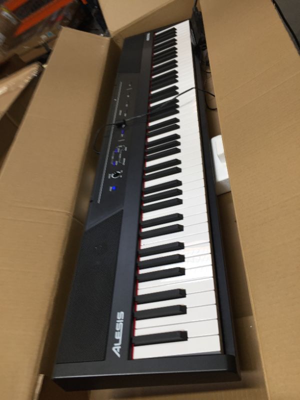 Photo 3 of Alesis Recital – 88 Key Digital Piano Keyboard with Semi Weighted Keys, 2x20W Speakers, 5 Voices, Split, Layer and Lesson Mode, FX and Piano Lessons
