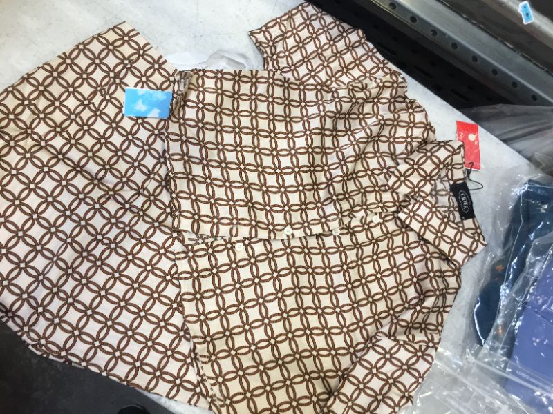 Photo 1 of set of skirt and shirt
brown design 
small
~~ china size runs small ~~