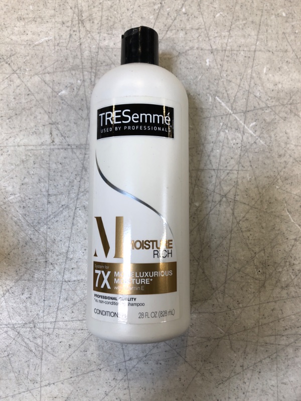 Photo 1 of TRESemmé Rich Moisture Conditioner for Dry Hair Rich Moisture Hydrating Conditioner Formulated With Vitamin E and Biotin 28 oz
