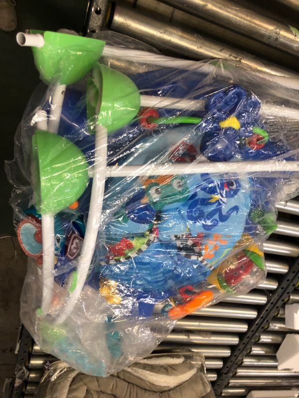Photo 1 of Baby bouncer seat with toys