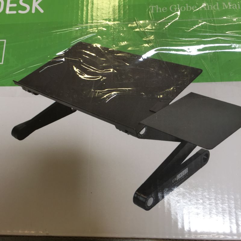 Photo 1 of ADJUSTABLE LAPTOP STAND AND LAP DESK UNCAGED