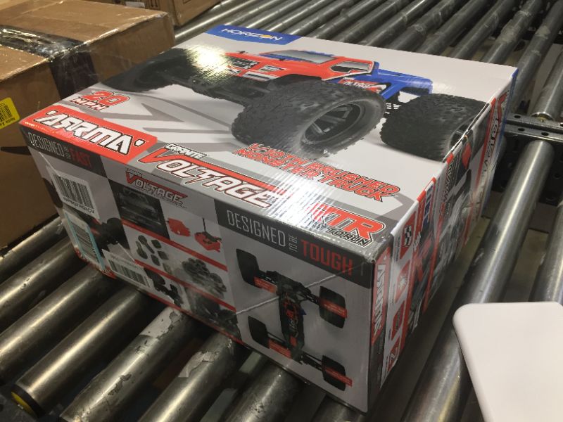 Photo 2 of ARRMA RC Monster Truck: 1/10 Granite Voltage MEGA 2WD SRS RTR with 2.4GHz Radio | 1800mAh 6C NiMH Battery | Charger | 1:10 Scale (Red/Blue), ARA102727T1, Red & Blue
